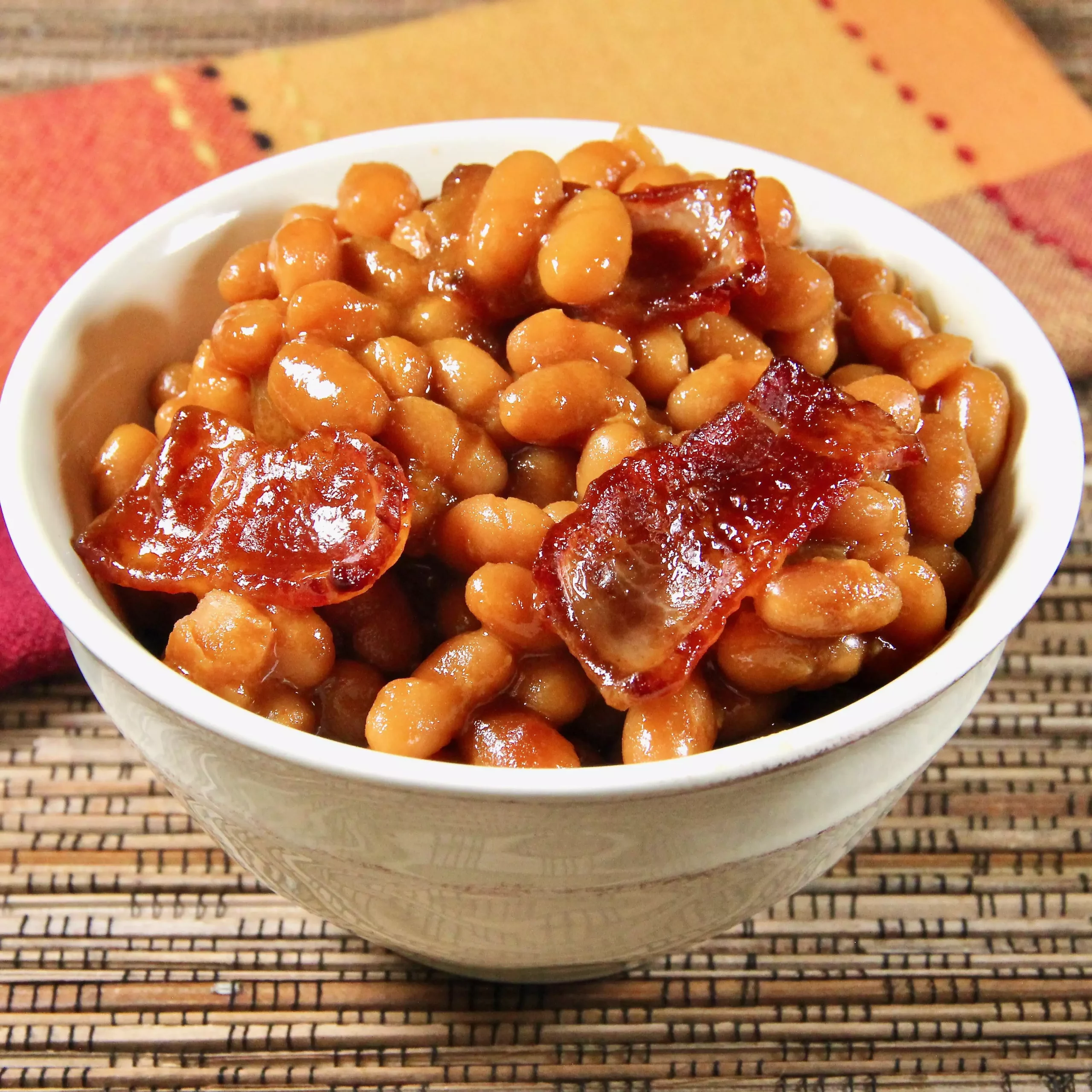 How many calories are in a cup of cooked brown beans