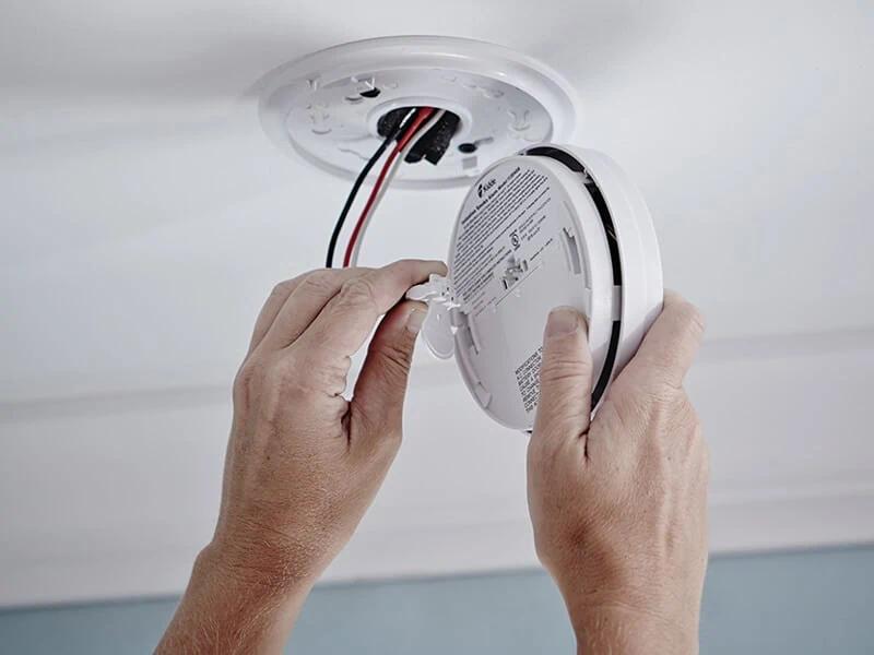 Can you replace electric smoke detectors with battery ones